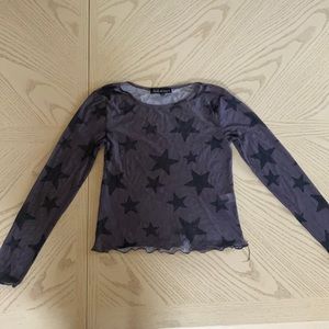 Sheer. Long sleeve Star top.